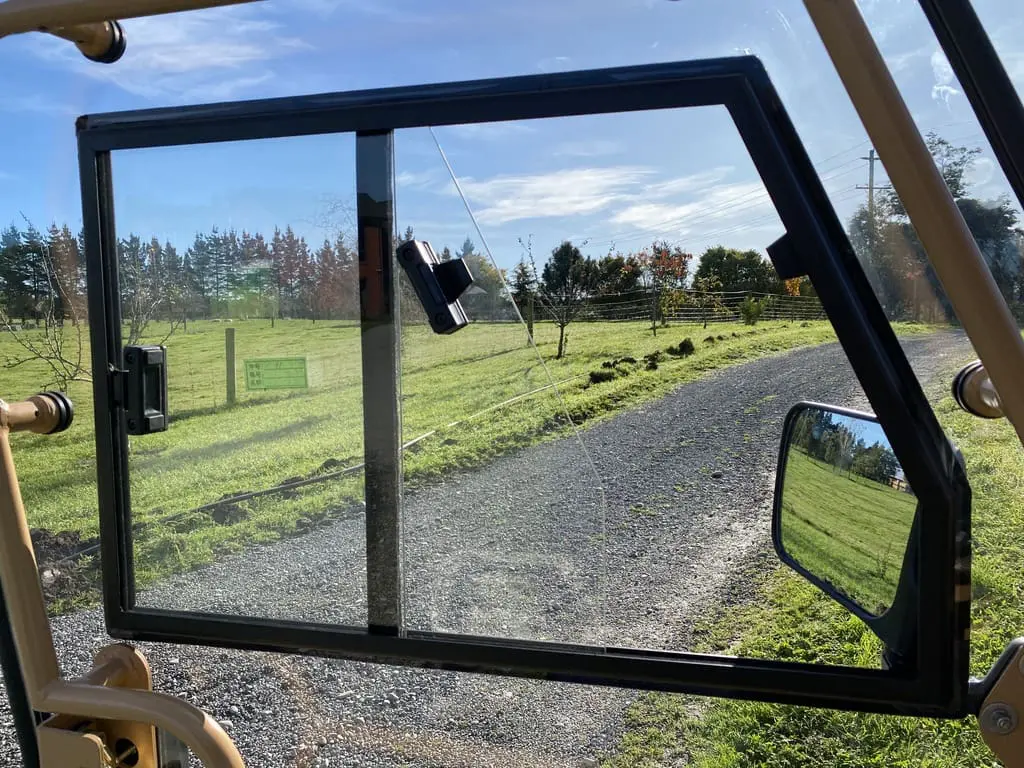 A view of a road from inside the vehicle.